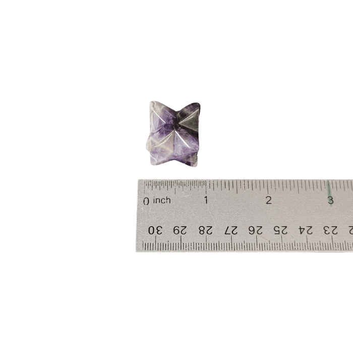 This is a singular 1 inch Amethyst merkaba