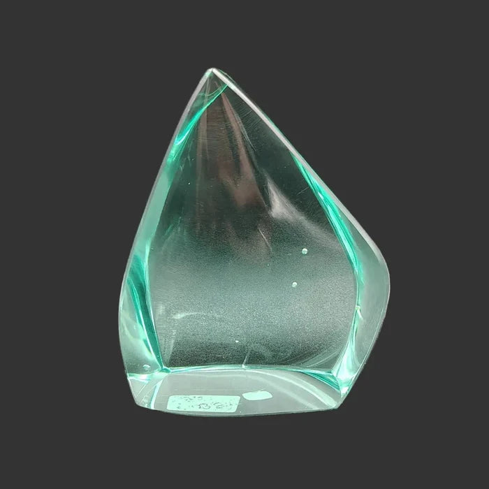 This is the back side of this polished blue green obsidian glass freeform.