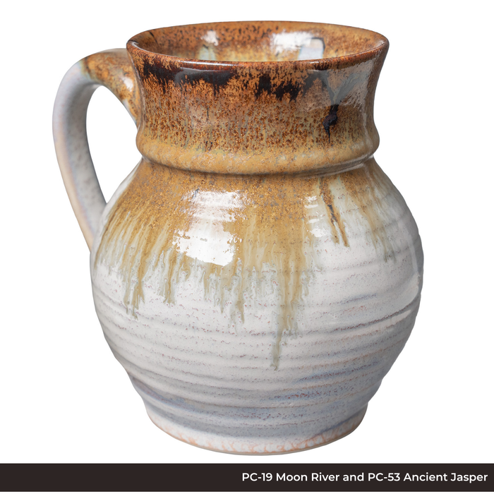 Mug in PC-19 Moon River and PC-53 Ancient Jasper glazes, speckled amber neck dripping over a white ribbed body