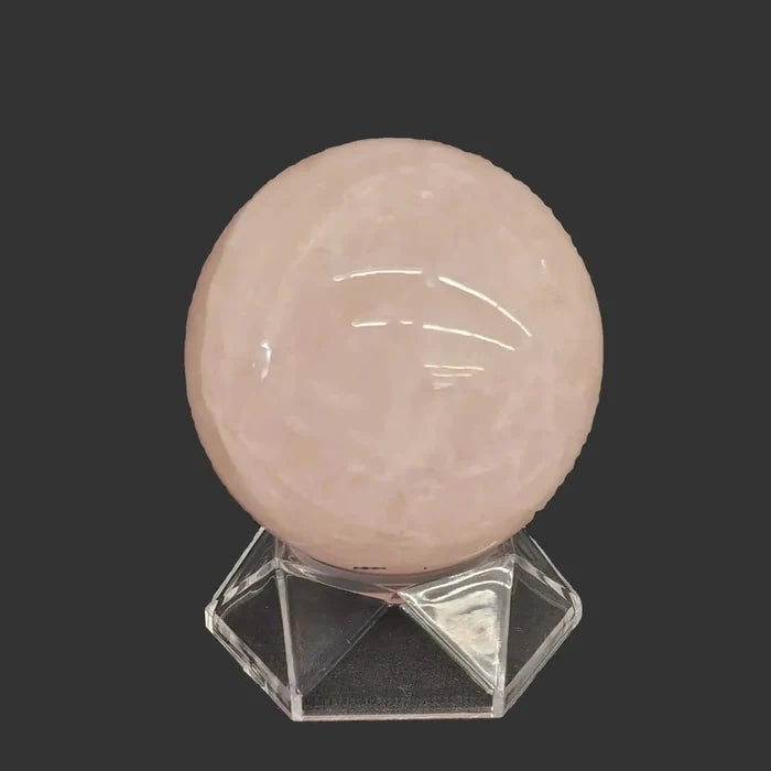 This hexagon shaped acrylic stand works perfectly for this rose Quartz sphere.
