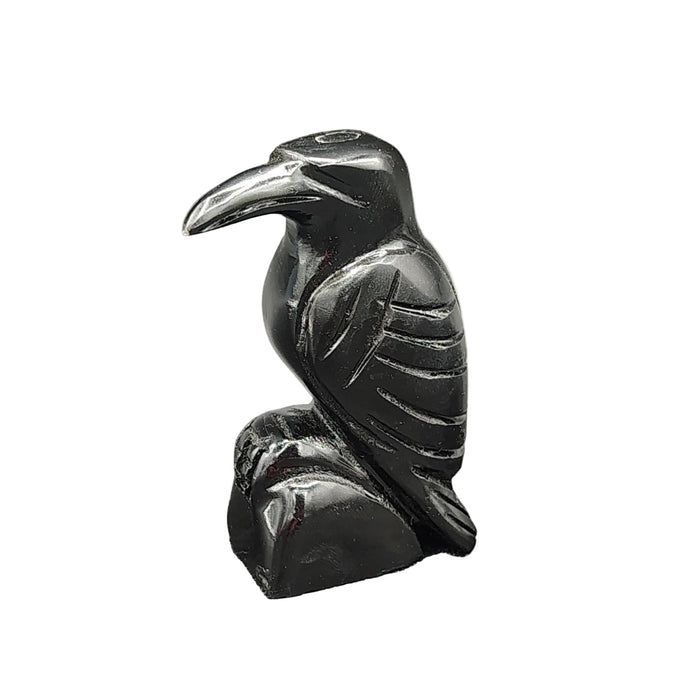 This is the left side of this polished hand carved black onyx raven.