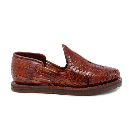 Men's handmade brown genuine leather huarache sandals featuring traditional woven Mexican craftsmanship, closed-toe slip-on design, leather-lined interior, cushioned footbed, and durable flexible outsole for everyday comfort.