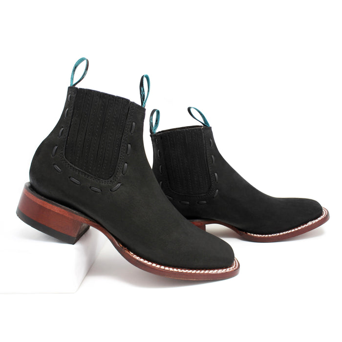 Side view of Los Altos Ladies Ankle Boot in Black Nobuck featuring elastic panels and Western heel.