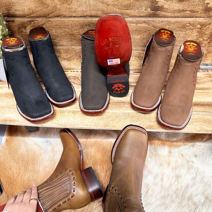 Display of Los Altos Ladies Ankle Boots in multiple colors, including Black Nobuck, showing sole detail and finish.