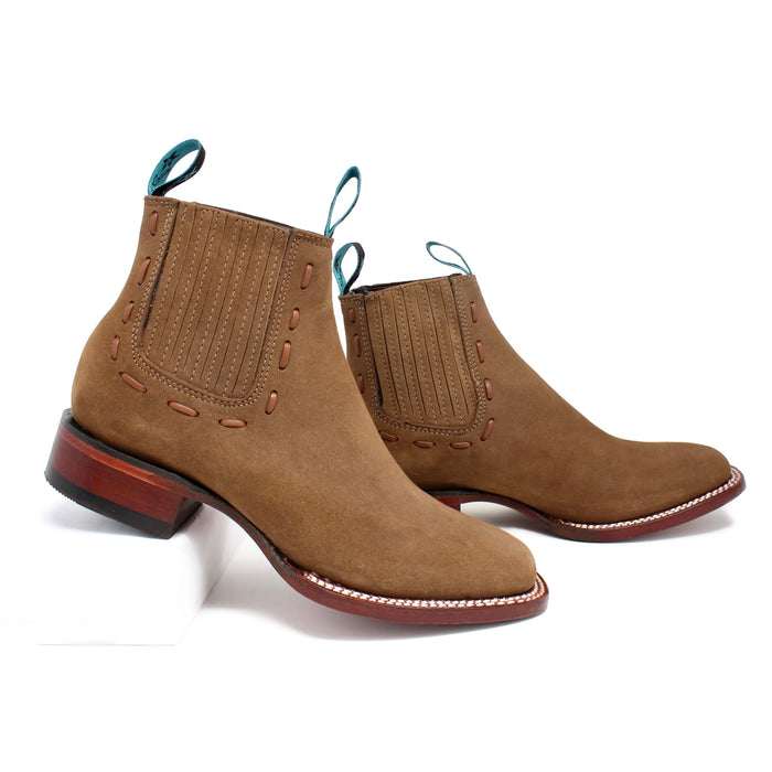 Side view of Los Altos Ladies Ankle Boot in Taupe Nobuck featuring elastic panels and Western heel.