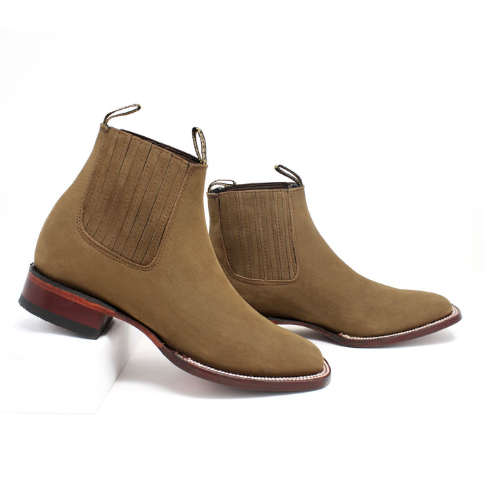 Side view of men’s Los Altos brown nobuck ankle boots with leather sole and elastic panels.