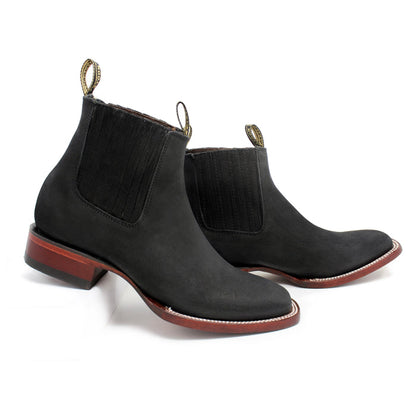 Side view of men’s Los Altos black nobuck ankle boots with leather sole and elastic panels.