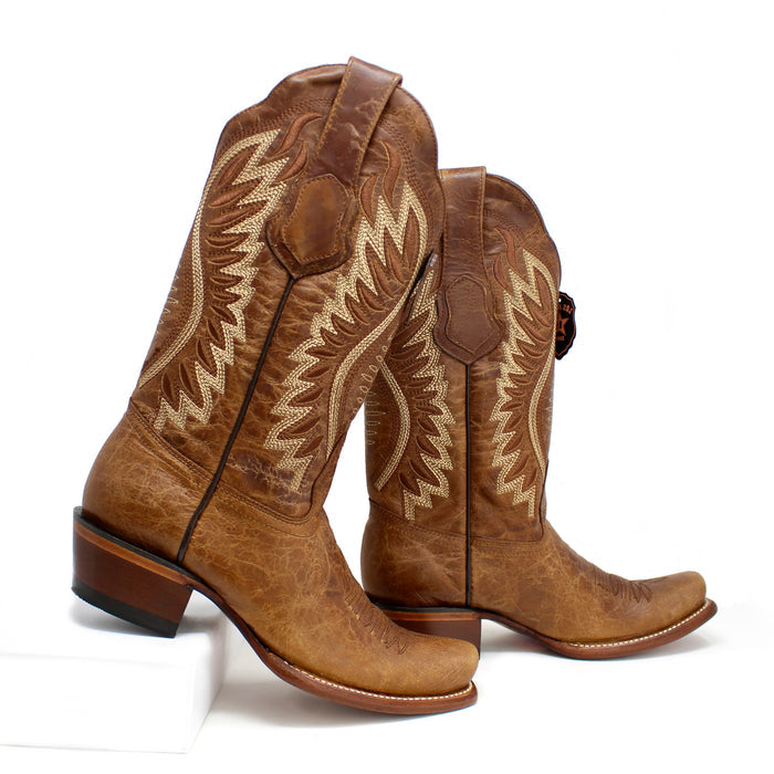 Side angle of the Los Altos Women’s Dubai Western Boots in Volcano Light Brown showing intricate Western stitching and stacked heel.