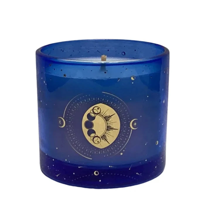 Blue candle with gold moon phases design on a white background