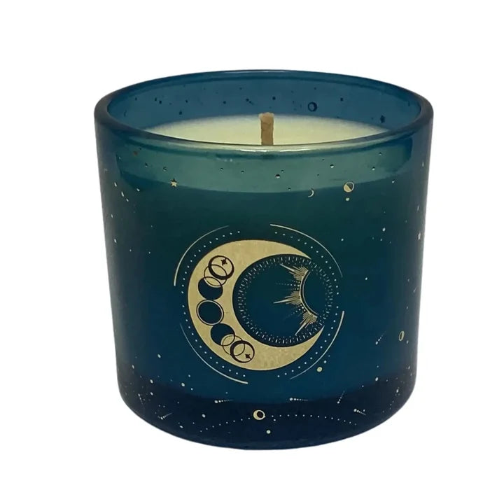 Blue candle jar with celestial design on a white background