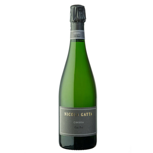 Green sparkling wine bottle with black capsule and dark label