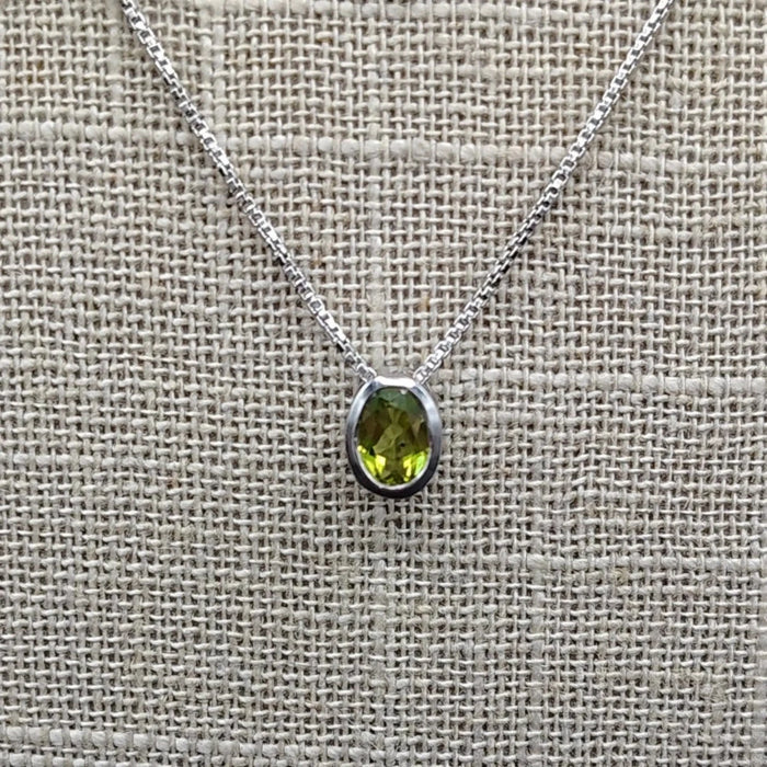 This is a close up of the Sterling Silver and Peridot pendant