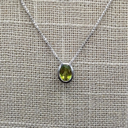 This is a close up of the Sterling Silver and Peridot pendant