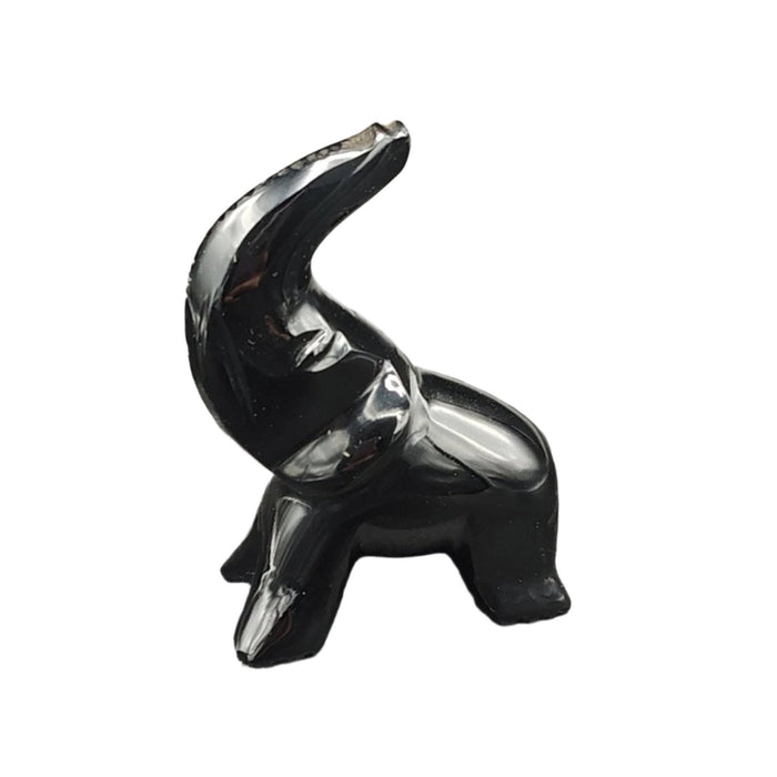 This is the left side of this Obsidian elephant figurine