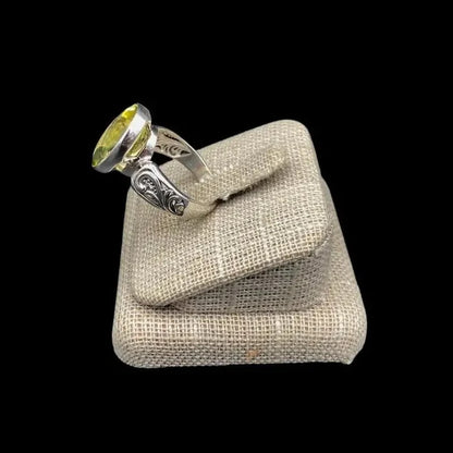 Side View Of Sterling Silver And Lemon Quartz Ring, Paisley Design On Each Side Of The Gemstone On Band