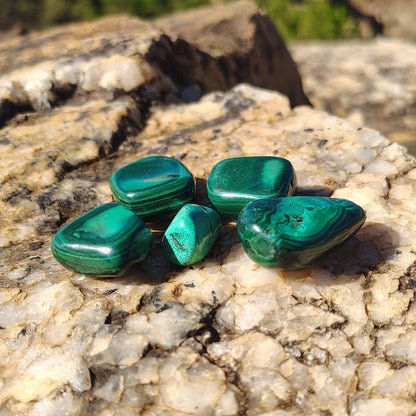 This is all the malachite stones included in this set in natural light.